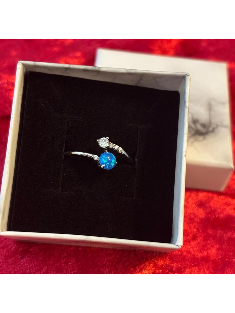 J113 NIB Silver with Cubic Zarconia And Blue Stone Ring